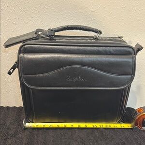Black Leather Laptop Bag with Sturdy Handle and Flap Closure
